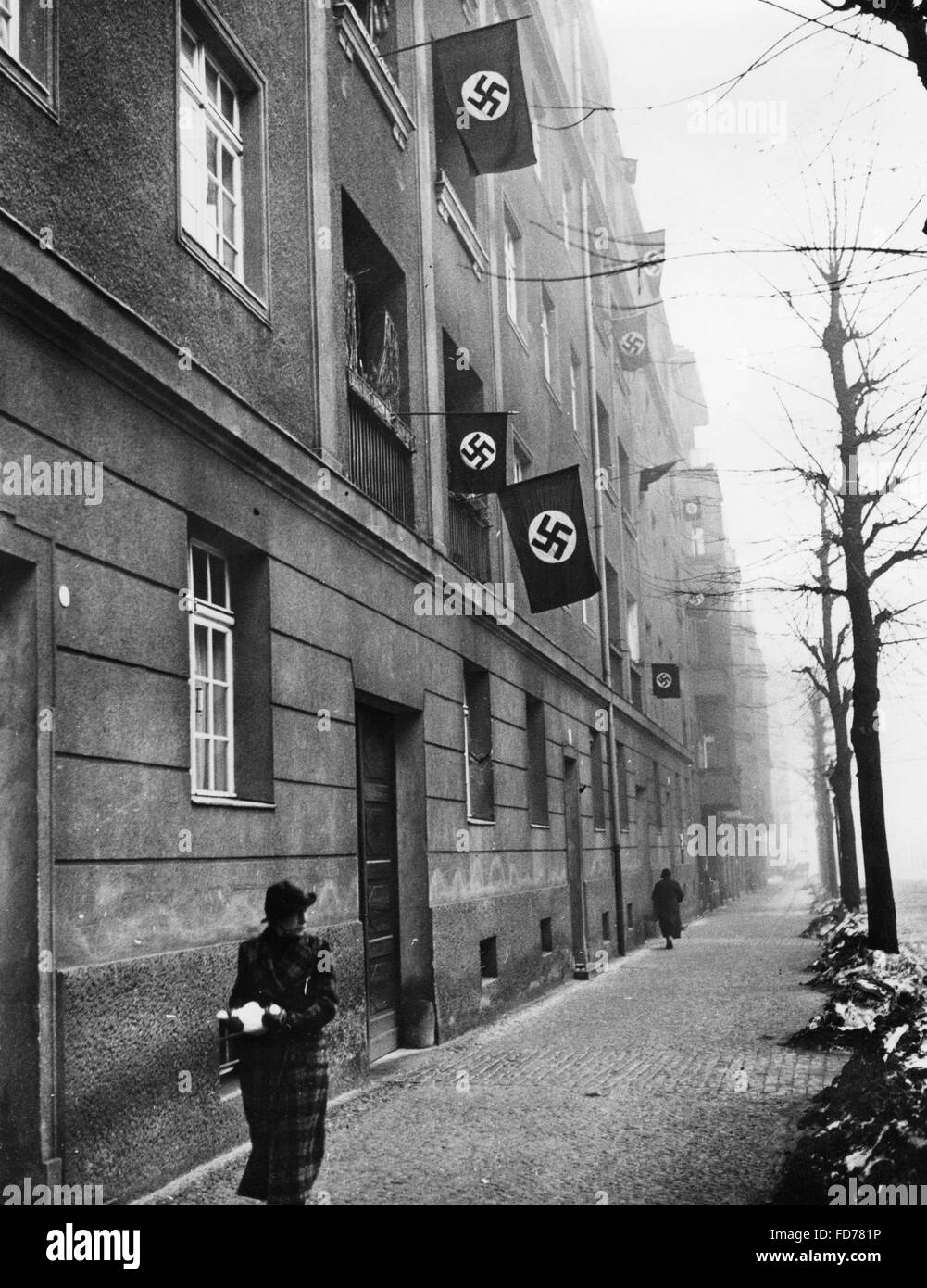 House decorated with swastika flags in Berlin, 1938 Stock Photo