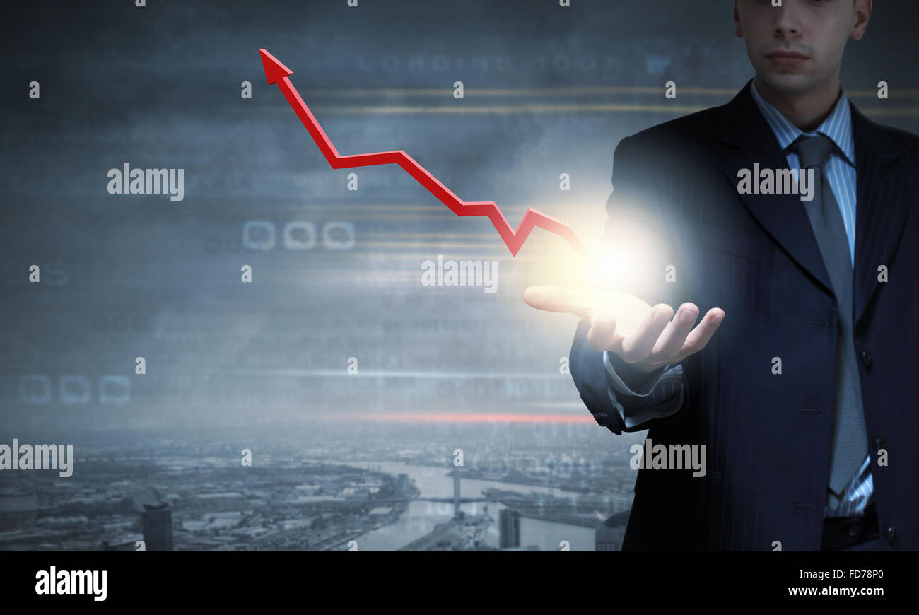Close up of businessman presenting growing graph Stock Photo - Alamy
