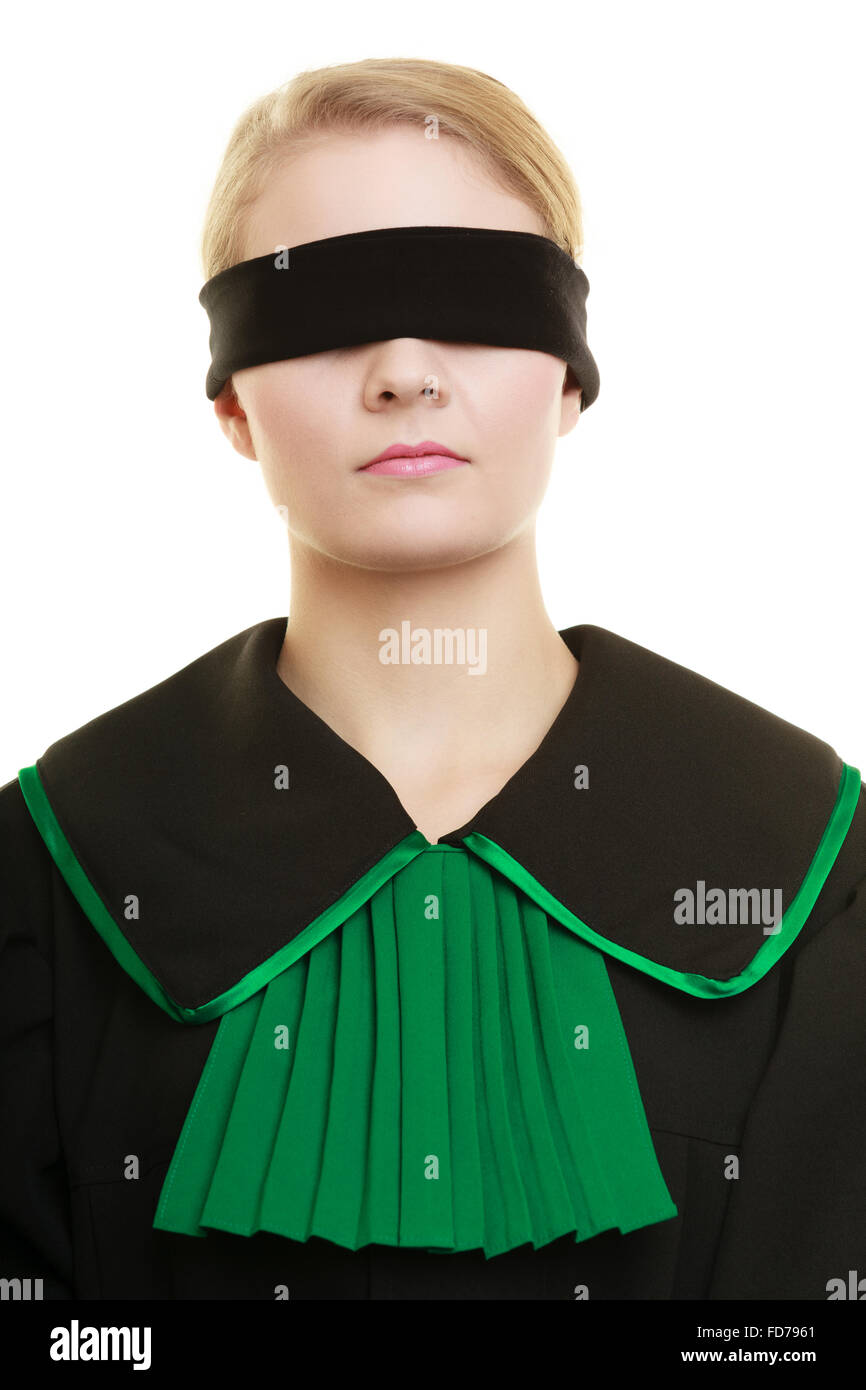 Blind justice. Woman lawyer attorney wearing classic polish (Poland) black green gown covering eyes with blindfold isolated. Stock Photo