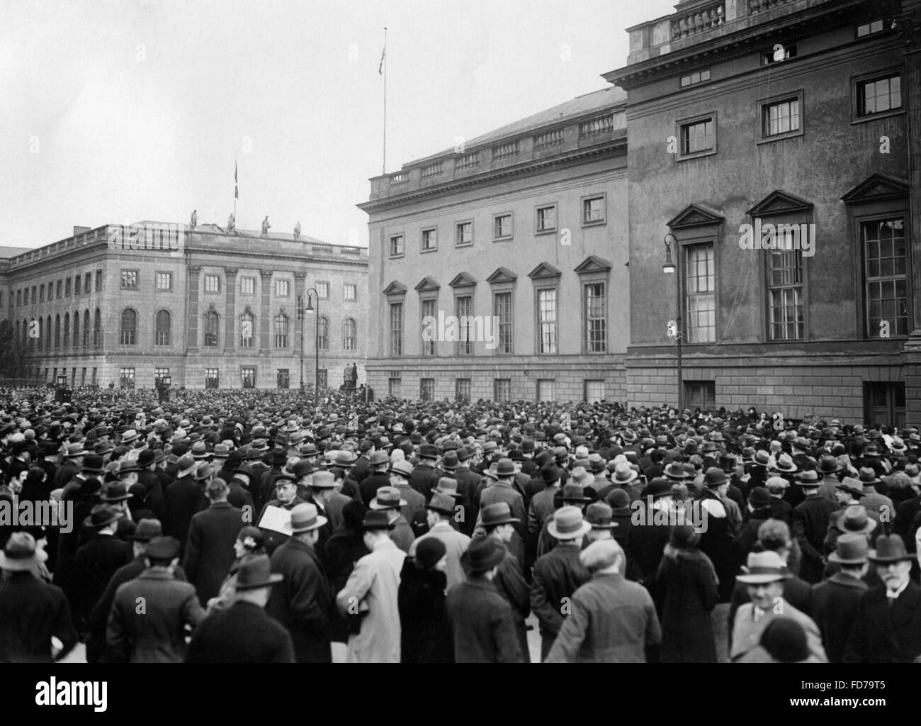Public radio listening before the Berlin State Opera, 1933 Stock Photo