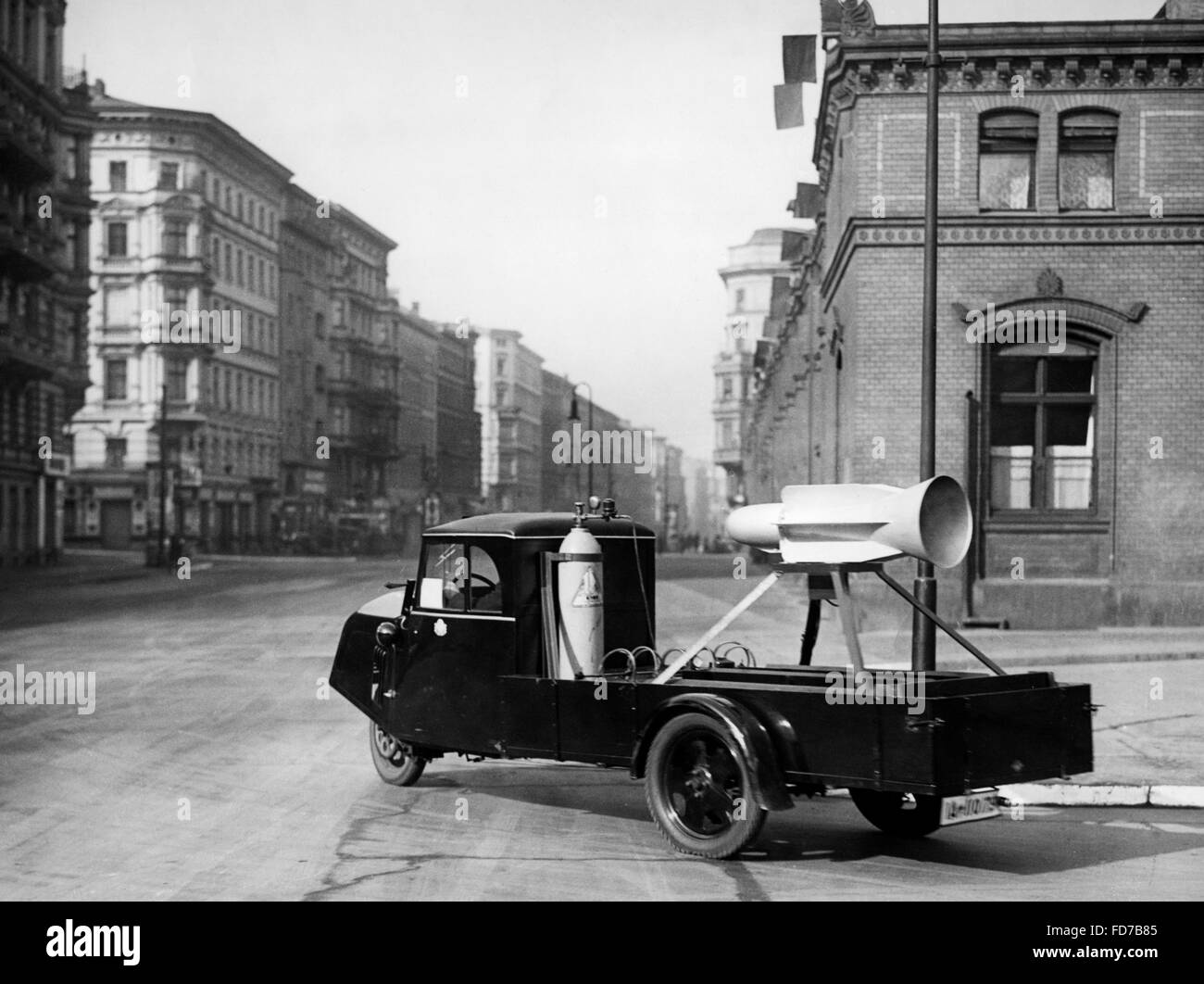 Car with alarm device at an air raid drill in Berlin, 1935 Stock Photo