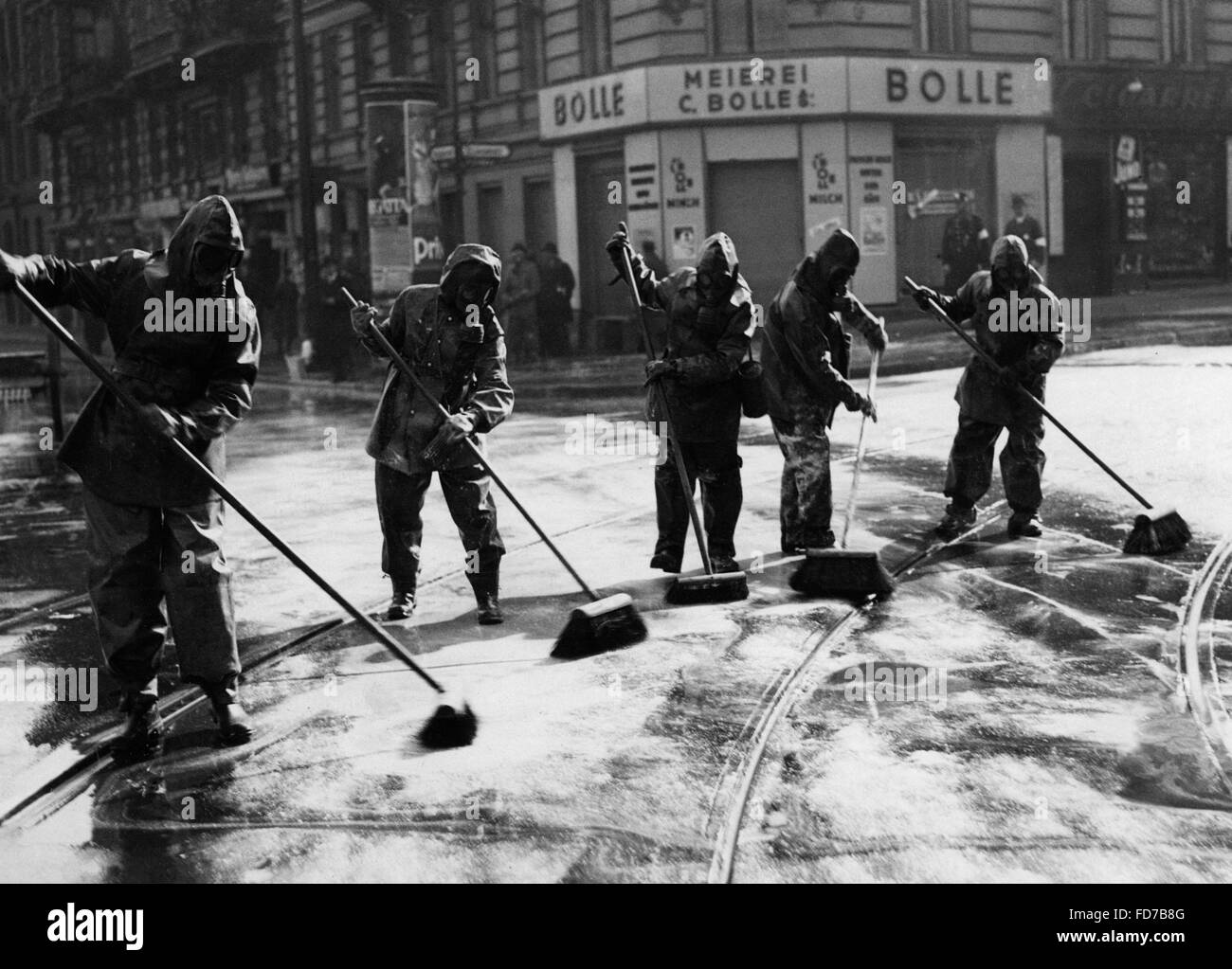 Cleaning up after an air raid drill, 1935 Stock Photo