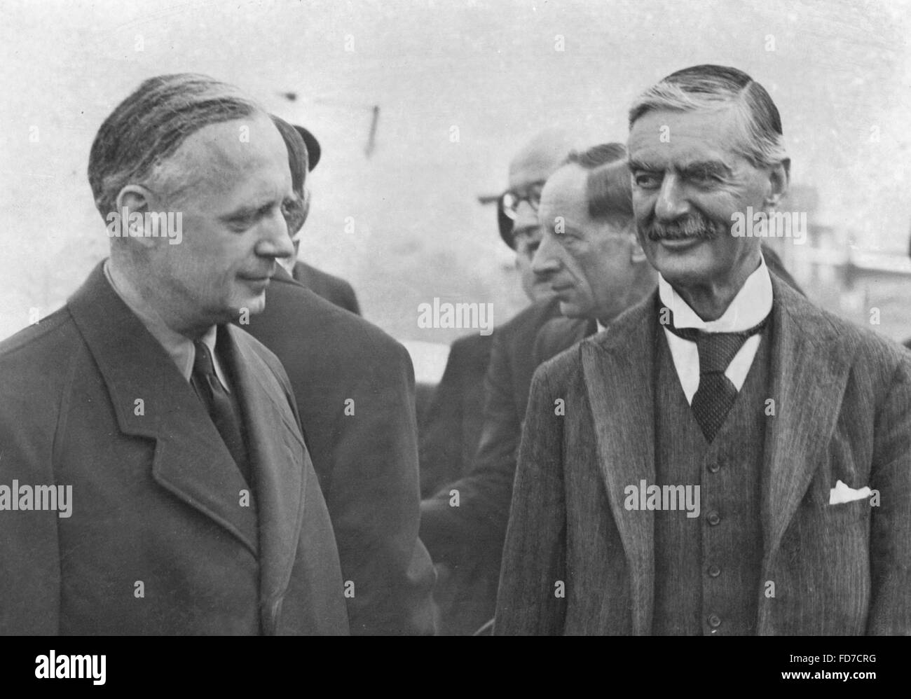Ribbentrop, Chamberlain and Wilson on the airfield Oberwiesenfeld, 1938 Stock Photo