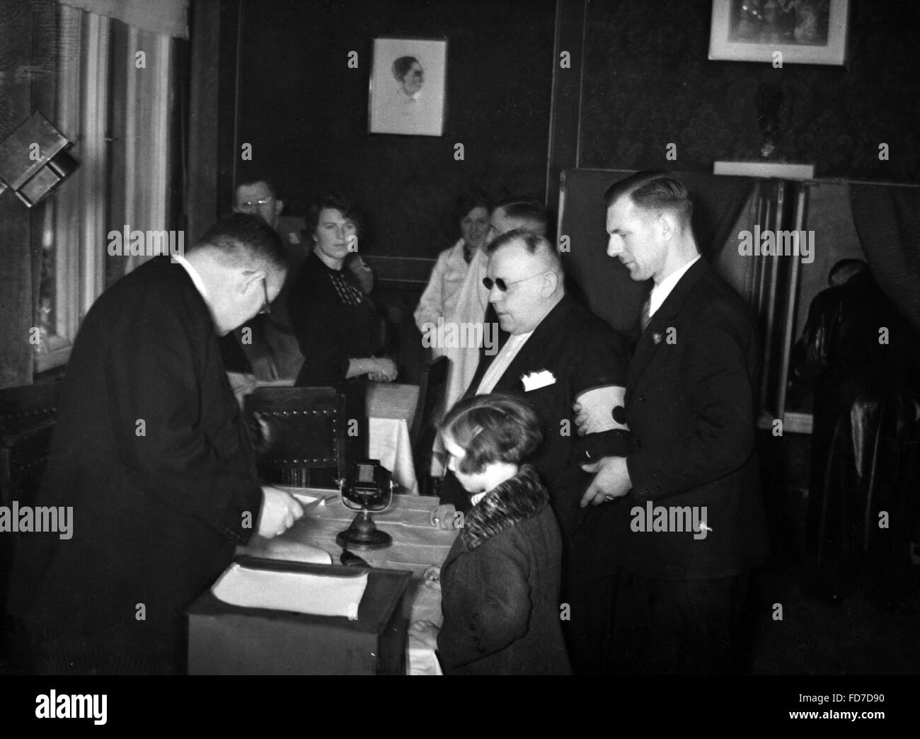 Blind person voting in Berlin in the Reichstag elections 1936 Stock Photo