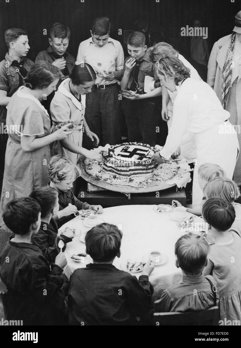 Hitler's birthday cake is being shared, 1934 Stock Photo