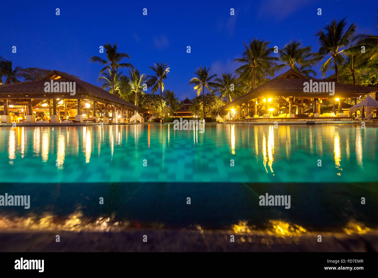 Hotel resort with pool at night, a poolside bar, InterContinental Bali