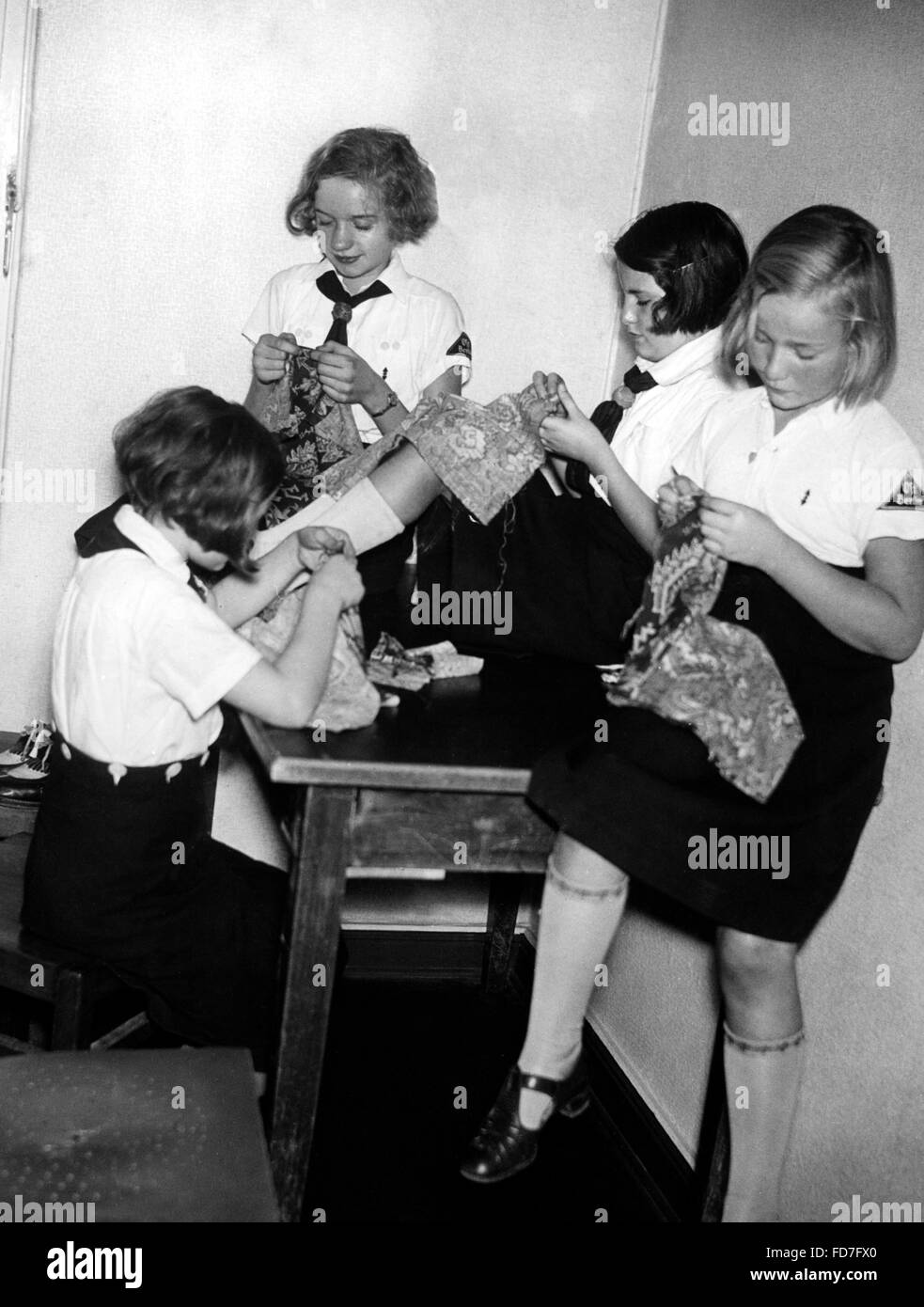 Members of the BDM doing handicrafts in Berlin-Charlottenburg, 1939 Stock Photo