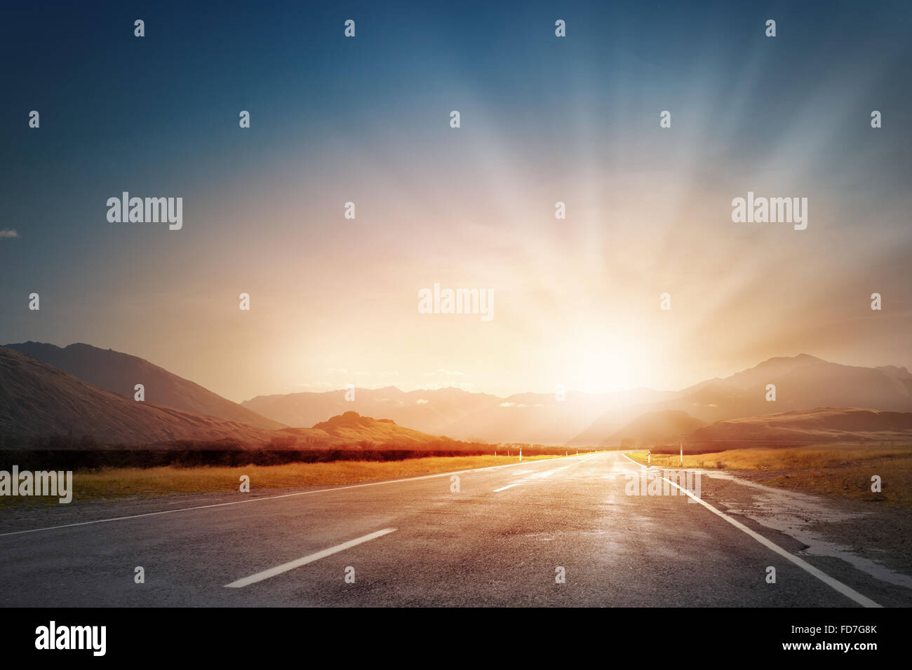 Nature landscape of sunset light above asphalt road Stock Photo - Alamy