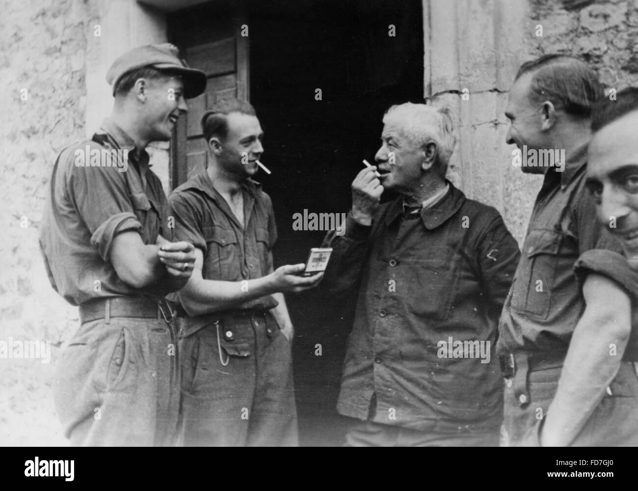 Wehrmacht soldiers with French civilians, 1944 Stock Photo - Alamy