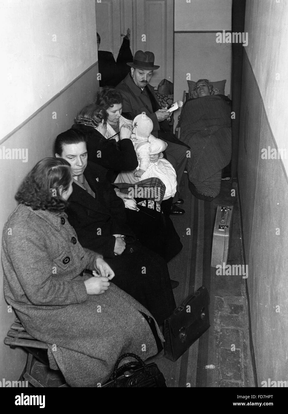 Citizens of berlin in a private air raid shelter date created hires