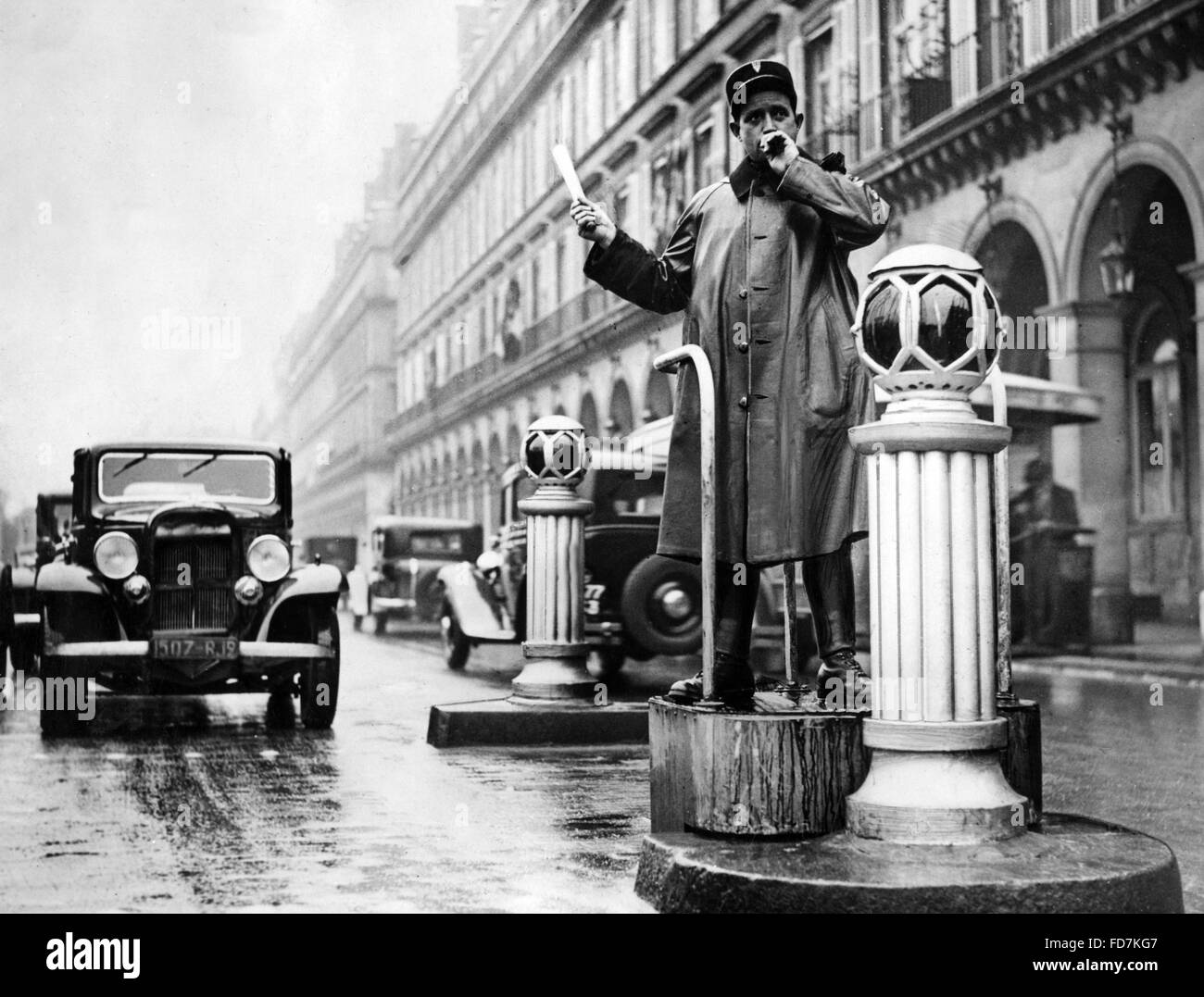 Traffic policeman in Paris, 1936 Stock Photo