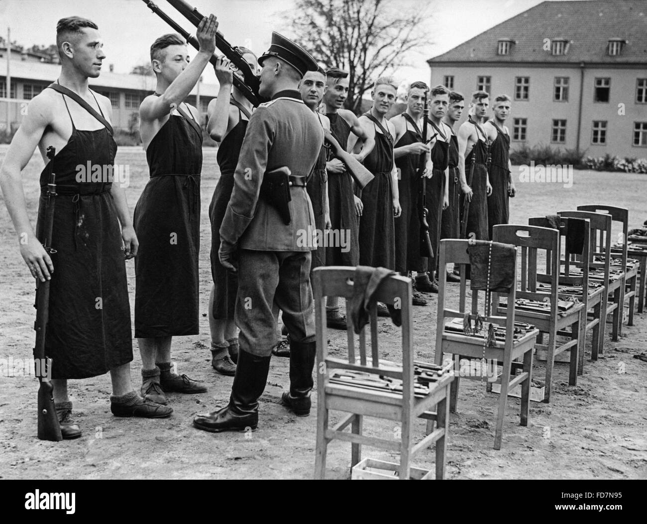 Cleaning of guns after a training, 1940 Stock Photo