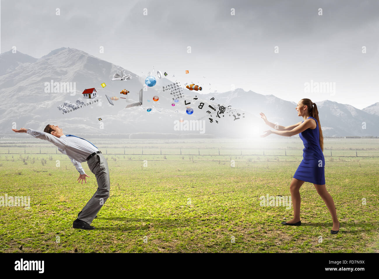 Young businessman trying to evade from thrown icons Stock Photo - Alamy