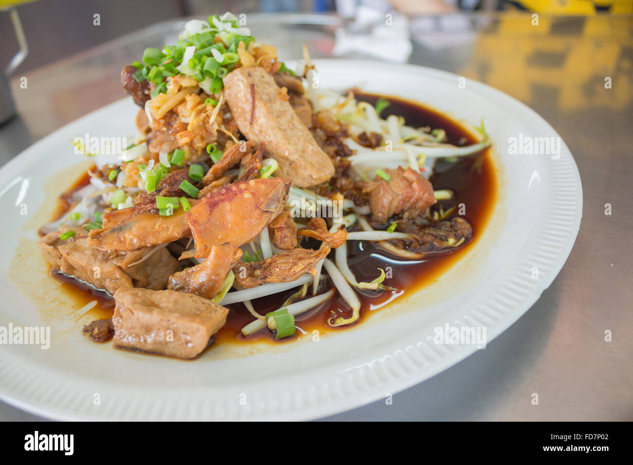 rice vermicelli noodle with brown sauce and bean sprout in dish Stock