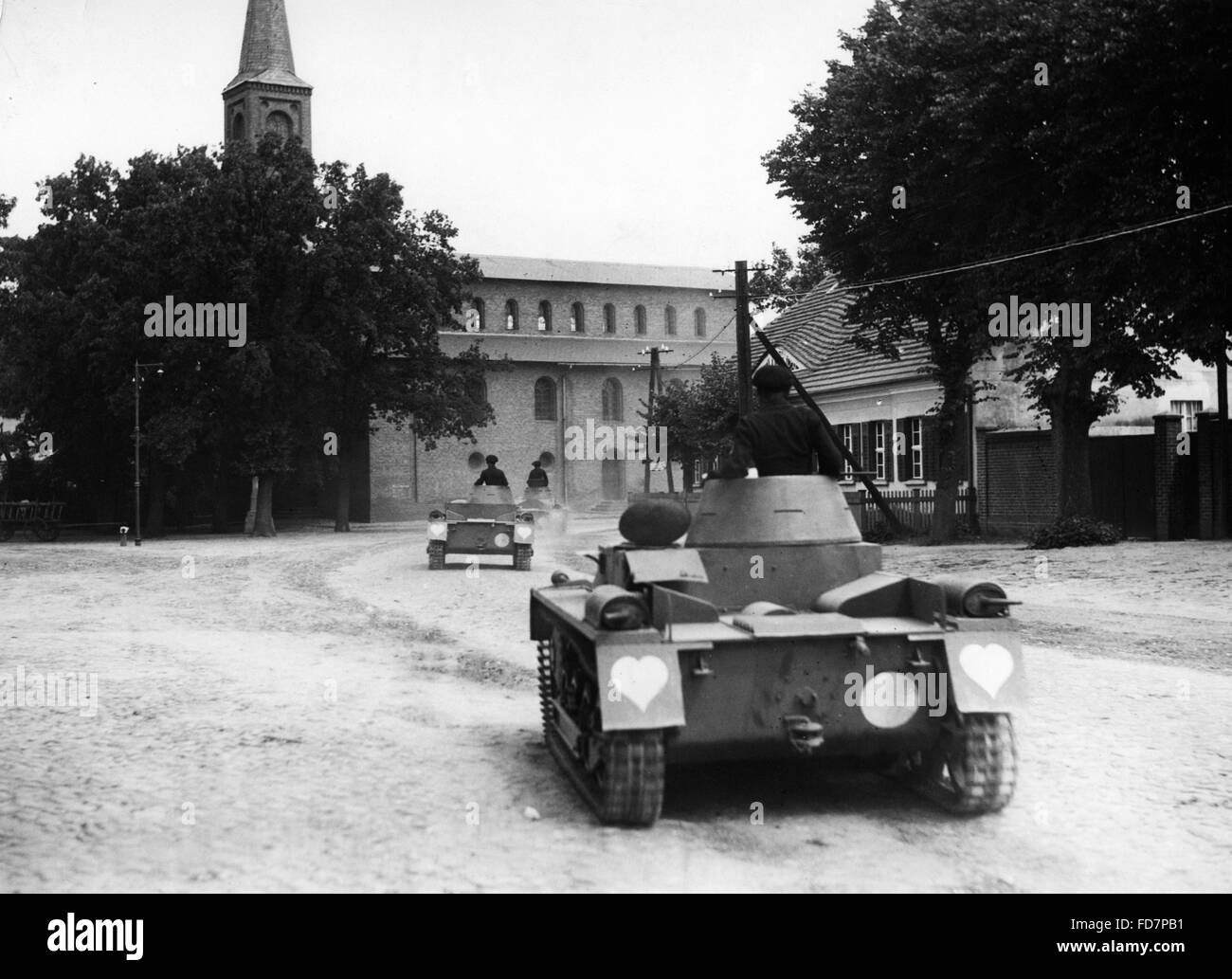Panzer I pass through a town in the 30s Stock Photo