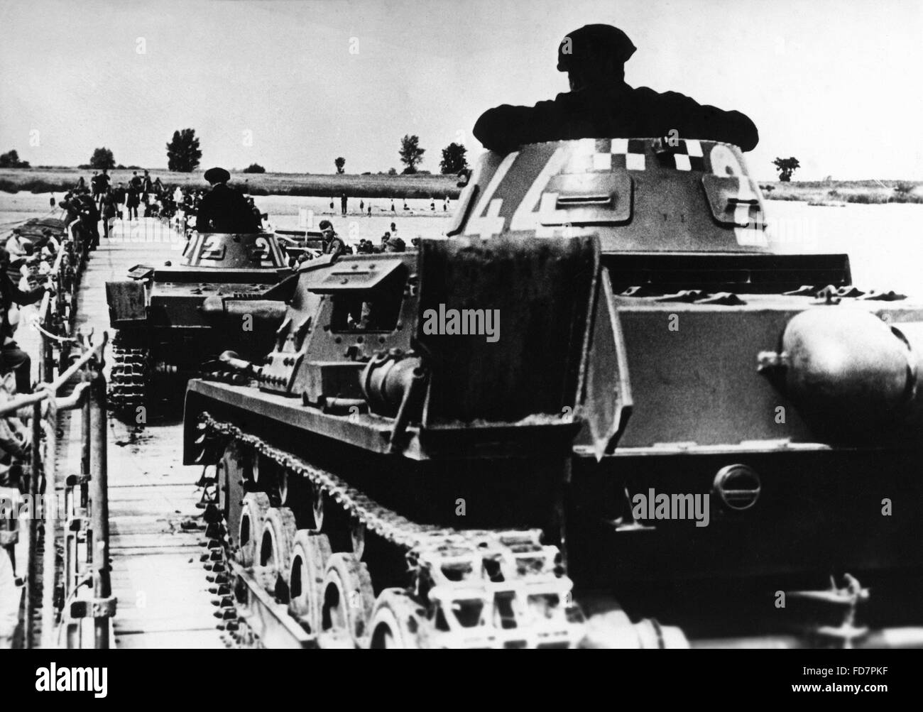 Panzer I tanks cross a pontoon bridge, 1938 Stock Photo