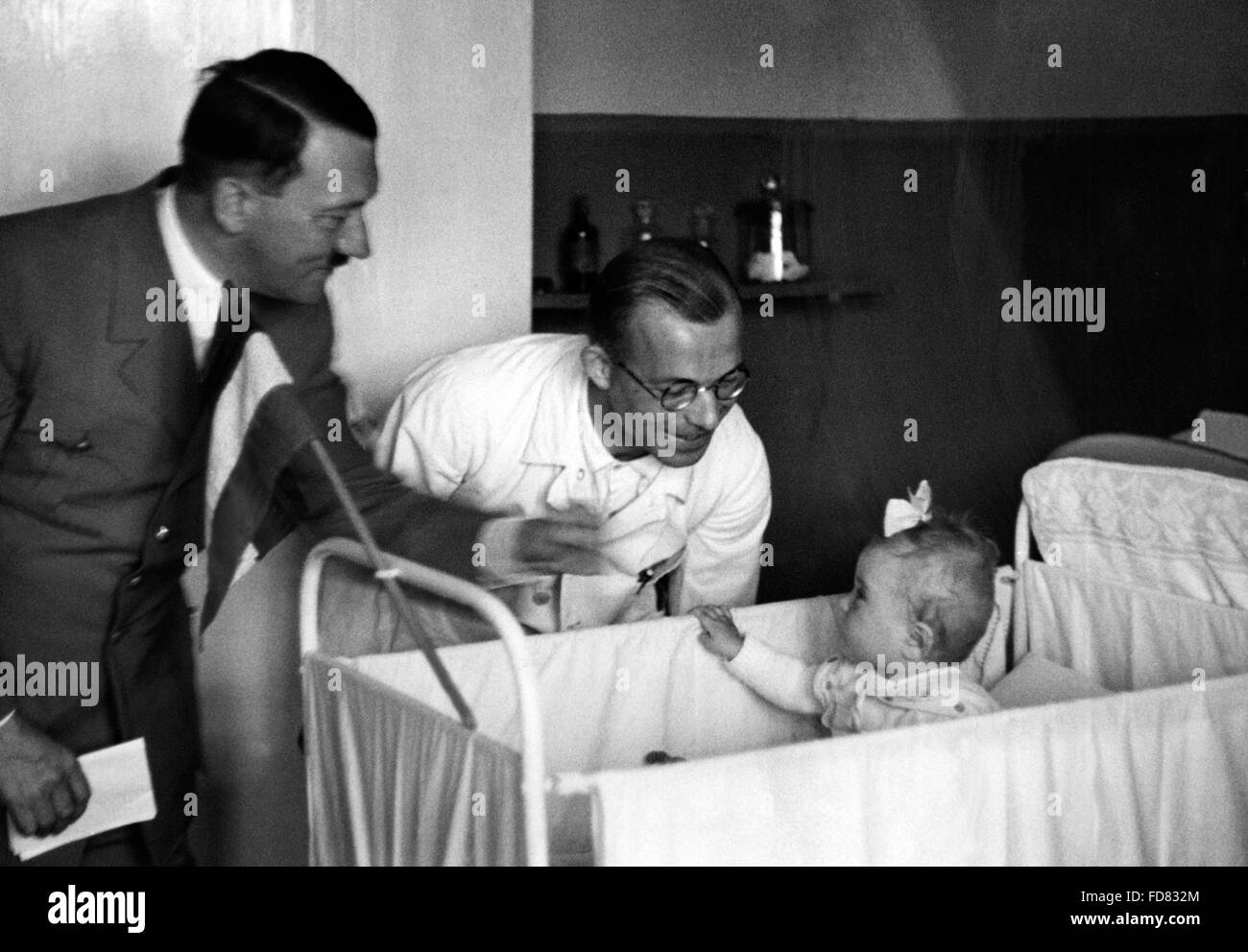 Adolf Hitler with a child, 1941 Stock Photo