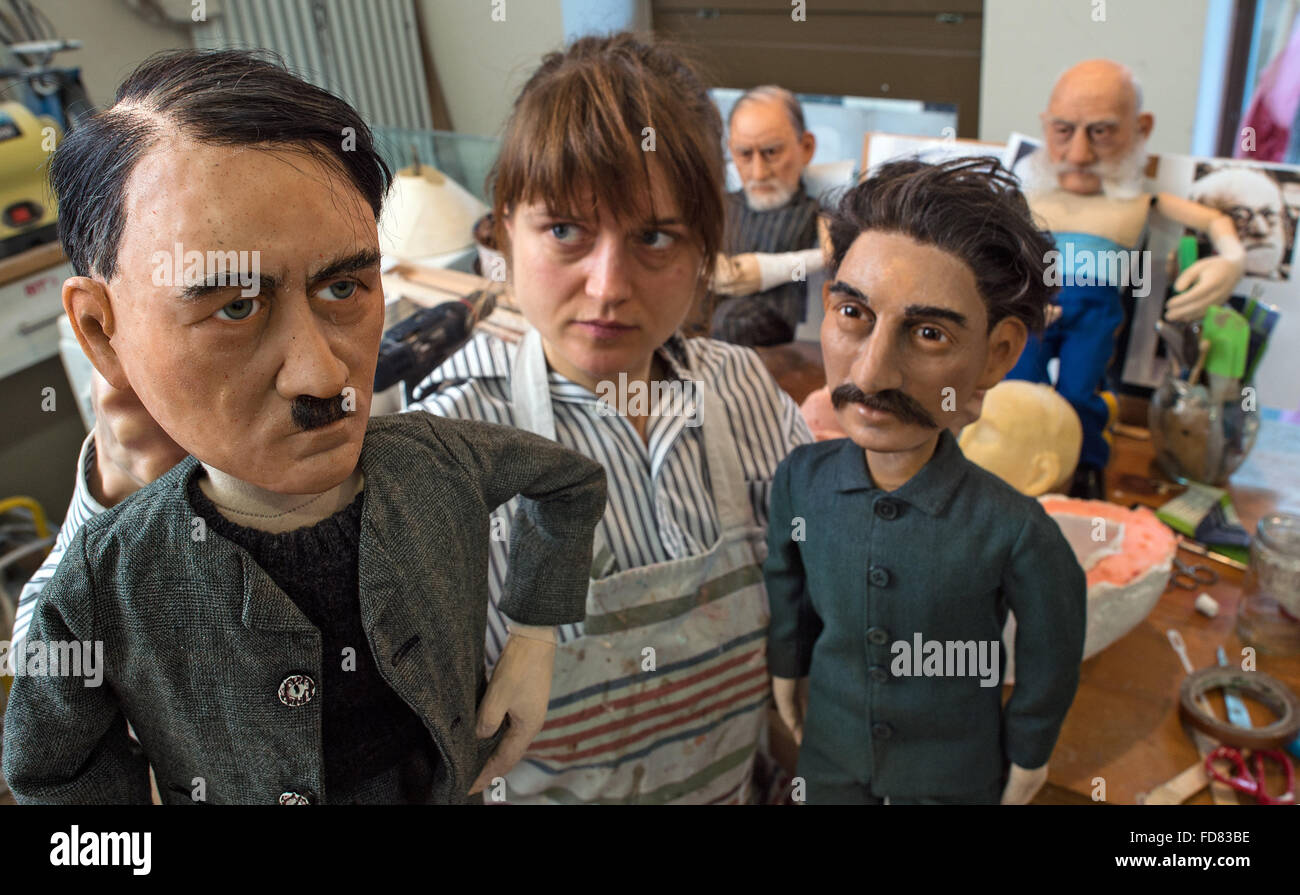 Louise Nowitzki prepares hand puppets for the performance '1913 - Der Sommer des Jahrhunderts' (lit. 1913 - the summer of the century) in a workshop of the puppet theatre in Halle/Saale, Germany, 19 January 2016. They include puppets of dictators Adolf Hitler and Josef Stalin. The puppet play premieres on 12 March 2016. PHOTO: HENDRIK SCHMIDT/DPA Stock Photo