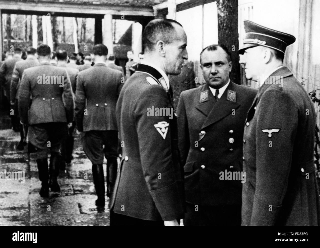 Adolf Hitler speaks to Bormann and Kraus, 1943 Stock Photo