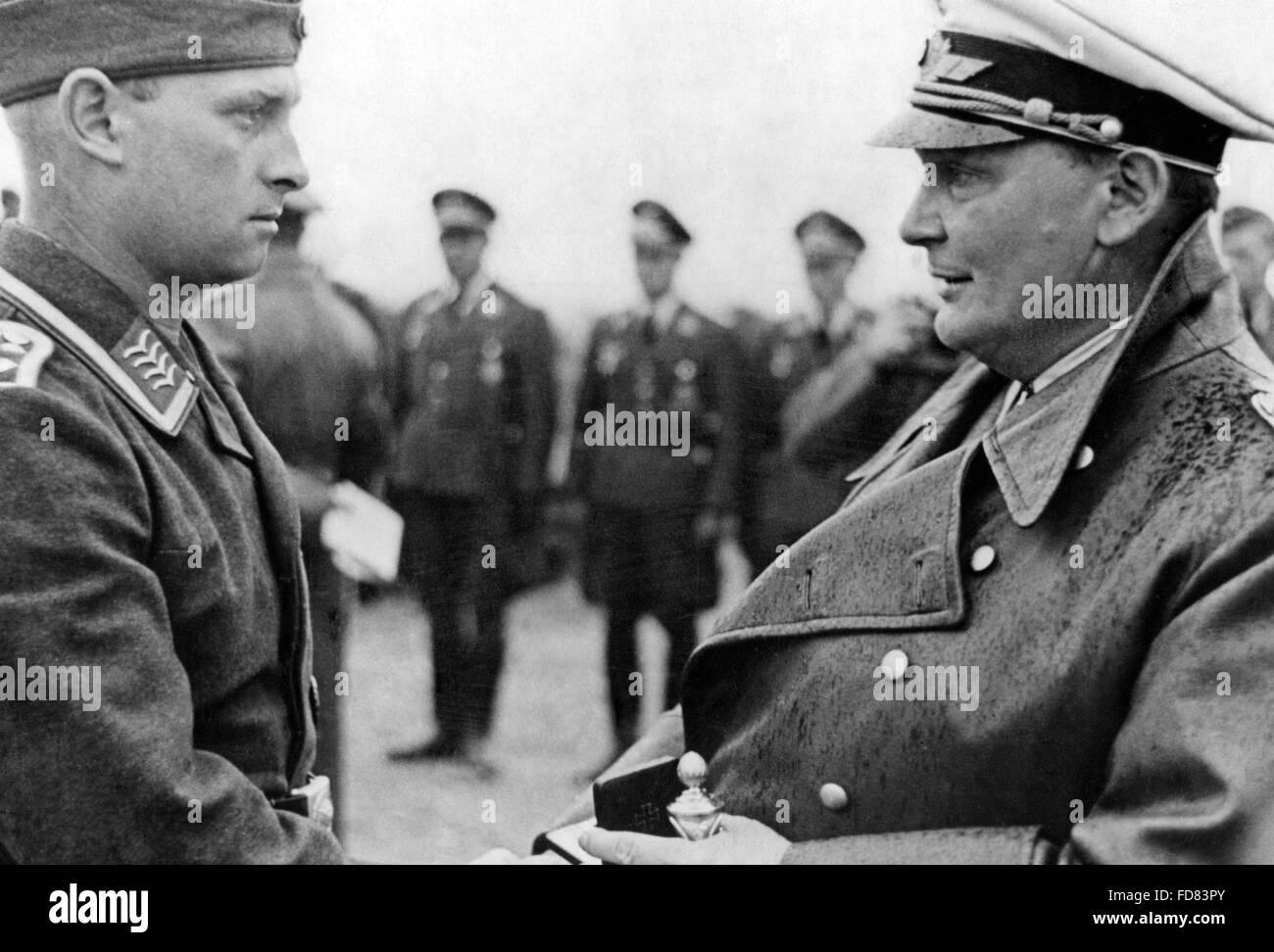 Hermann Göring honors a pilot with the Iron Cross 1st Class Stock Photo