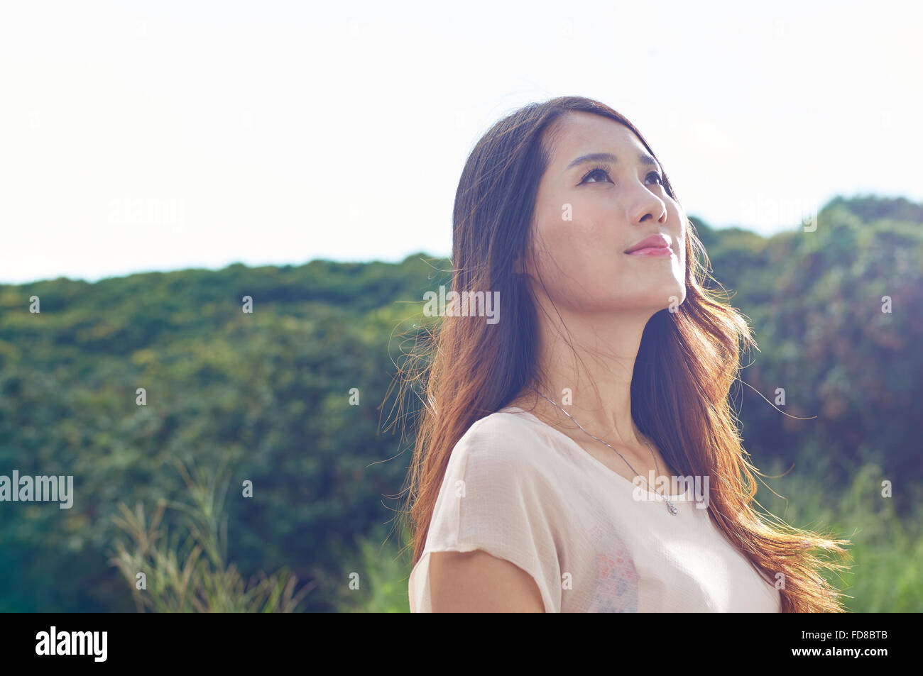 Chinese young beauty enjoy her time in nature Stock Photo