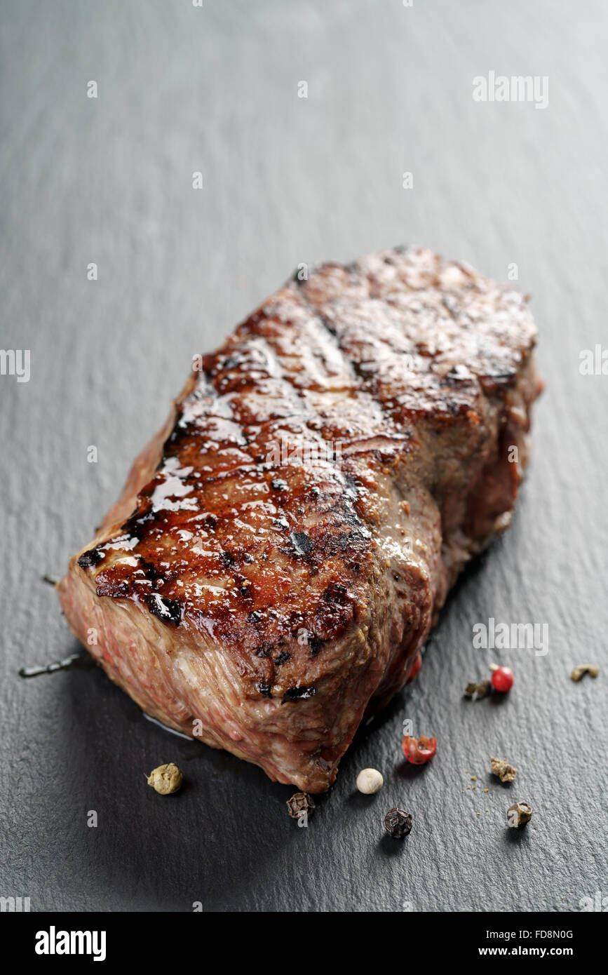 beef steak from entrecote part on slate board Stock Photo Alamy
