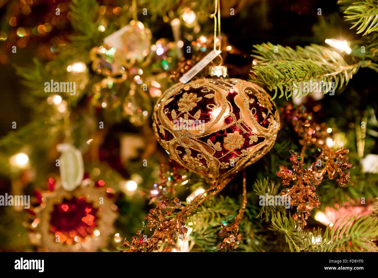 Glass Christmas ornament on tree Stock Photo