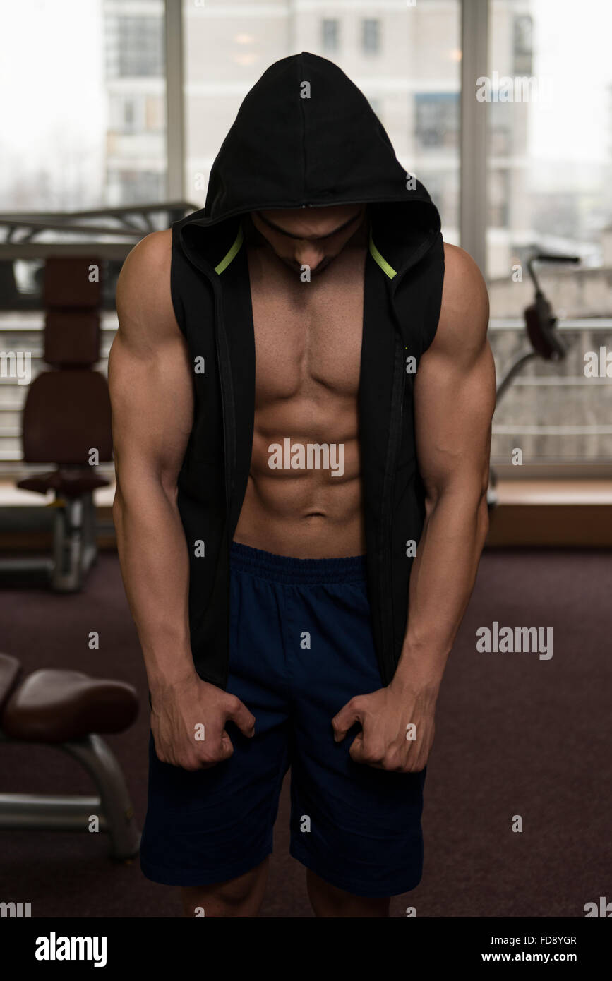 Portrait muscular man in hood hi-res stock photography and images - Alamy