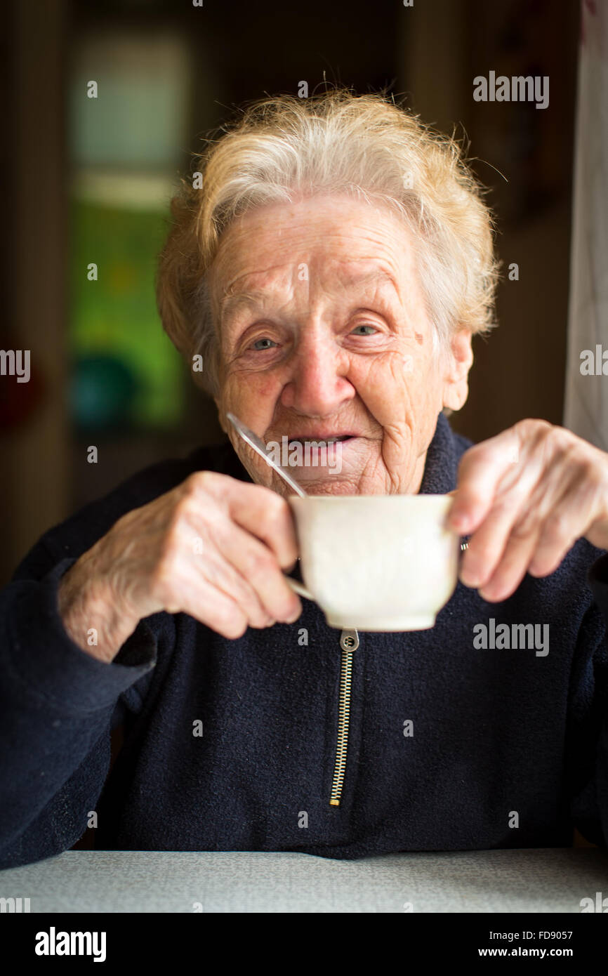 Old woman have tea hi-res stock photography and images - Alamy