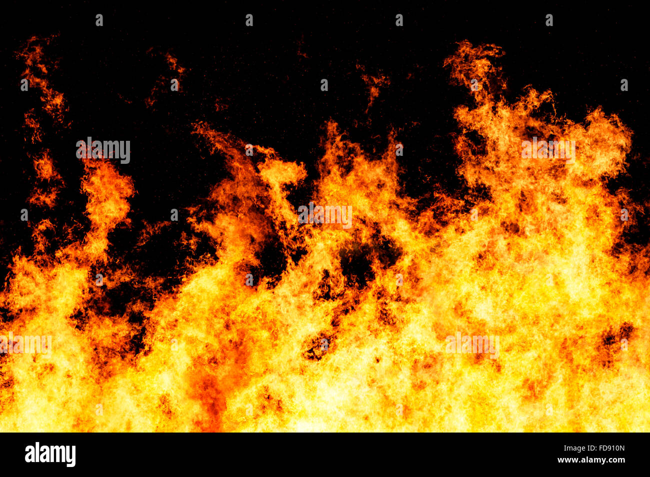 Raging fire shot at a high shutter speed to freeze the motion of the flames Stock Photo