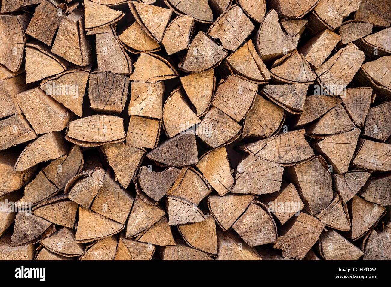 Stack of neatly arranged firewood ready for the winter Stock Photo