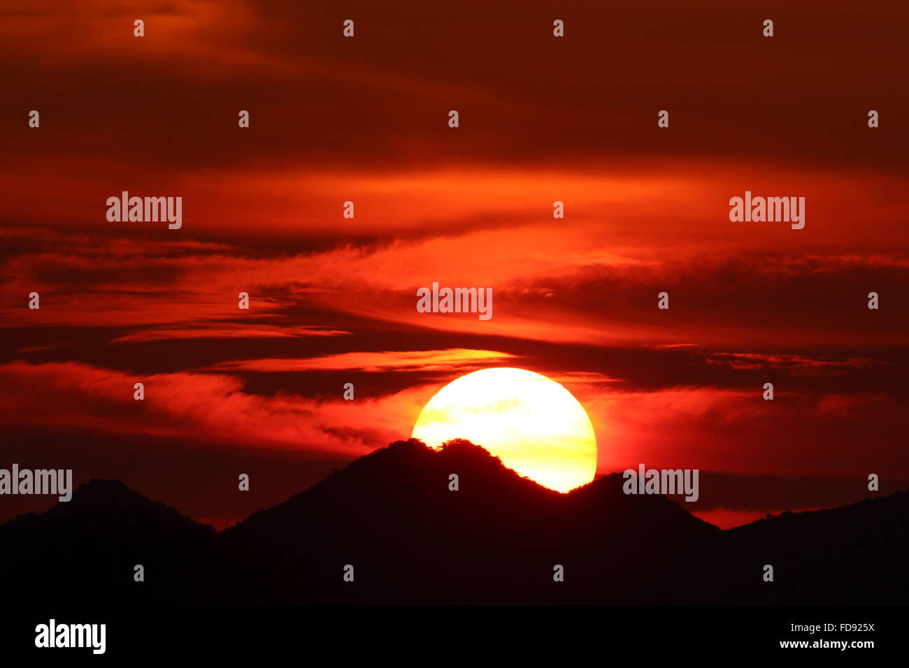 Red African Sunset with silhouette mountains, Limpopo South Africa ...