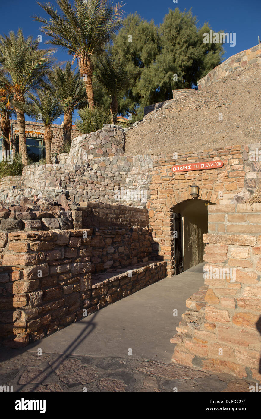 Entrance tunnel from parking lot under the Furnace creek inn Death Valley California. leading to the elevators and hotel lobby. Stock Photo
