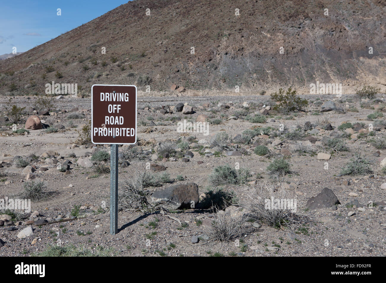 Driving off the road prohibited sign in death valley California . Laws to protect the valley for future visitors Stock Photo