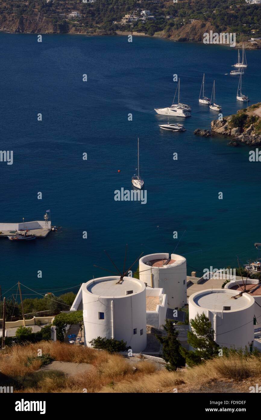 Old windmills, restored as holiday accommodation above Panteli harbour, Leros, Dodecanese Islands, Greece. Stock Photo