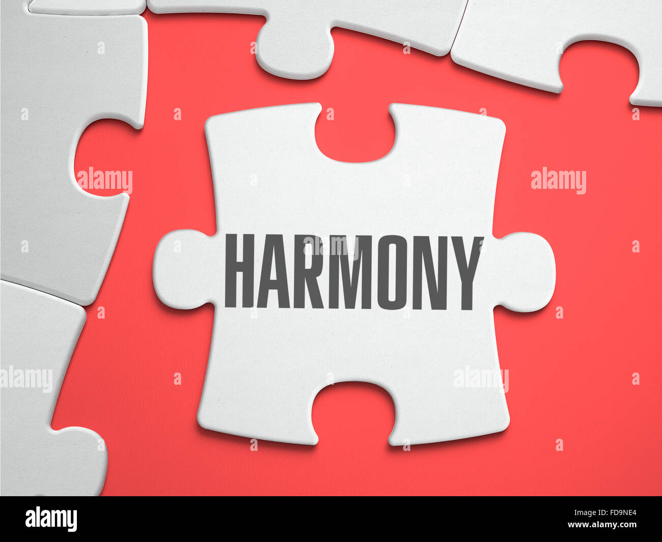 Harmony - Text on Puzzle on the Place of Missing Pieces. Scarlett Background. Closeup. 3d Illustration. Stock Photo