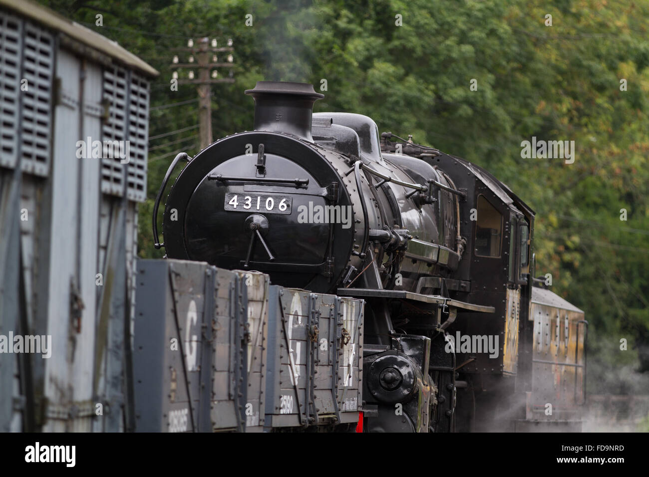 Class 4 43106 stands at Highley on the Severn Valley Railway with a short goods train. Stock Photo