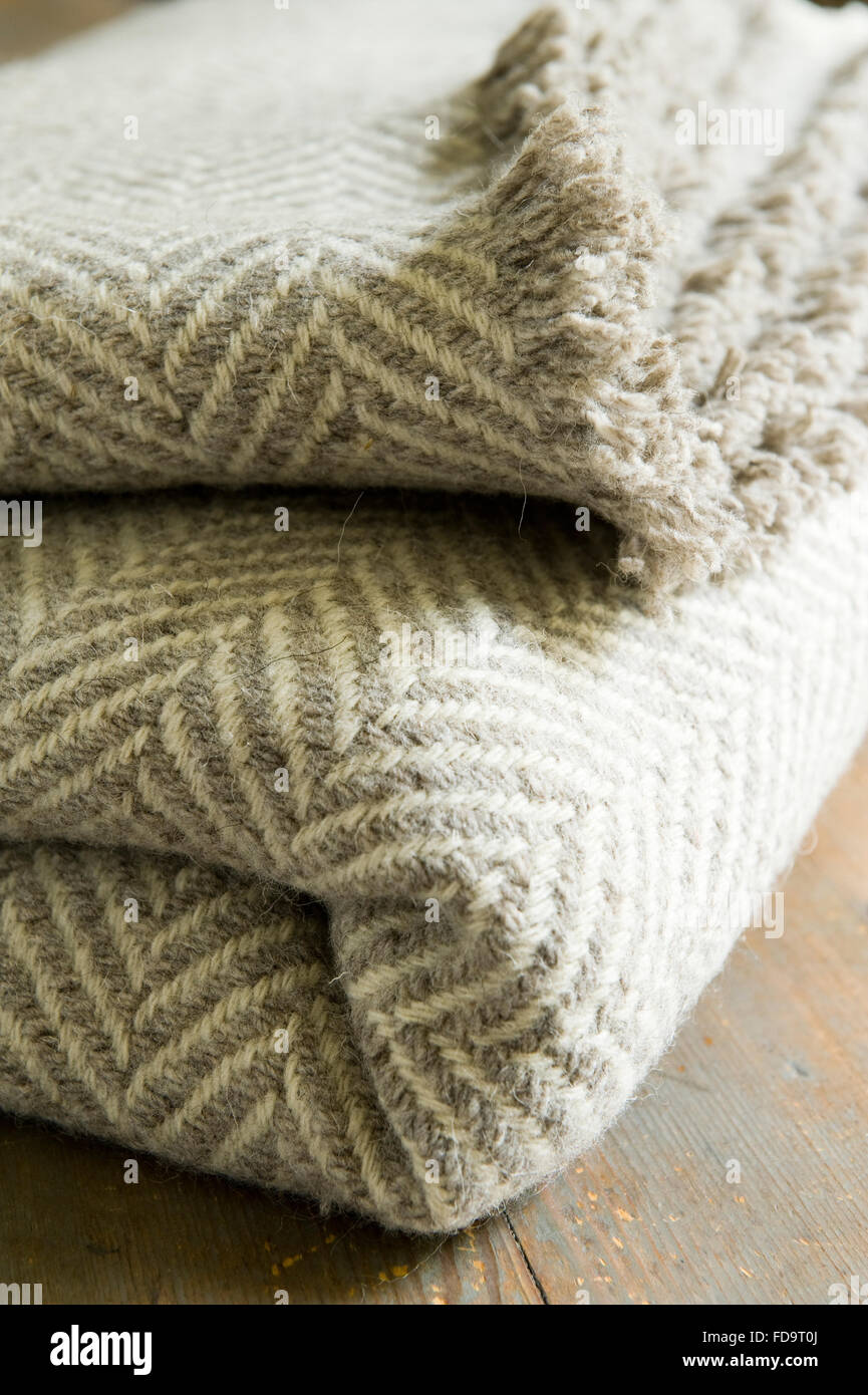 Fringed edge of woolen blanket Stock Photo