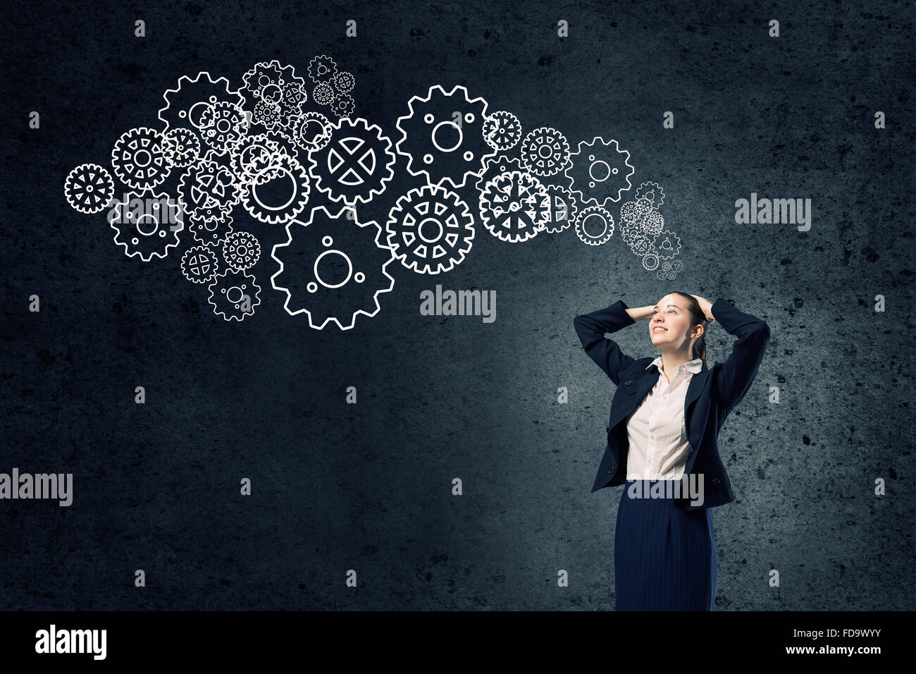 Young businesswoman with hands on head thinking something over Stock ...