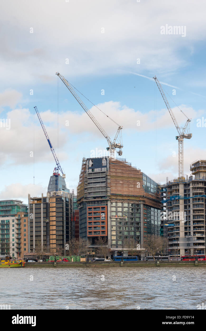 Tall buildings being built on the south side of the River Thames London UK Stock Photo