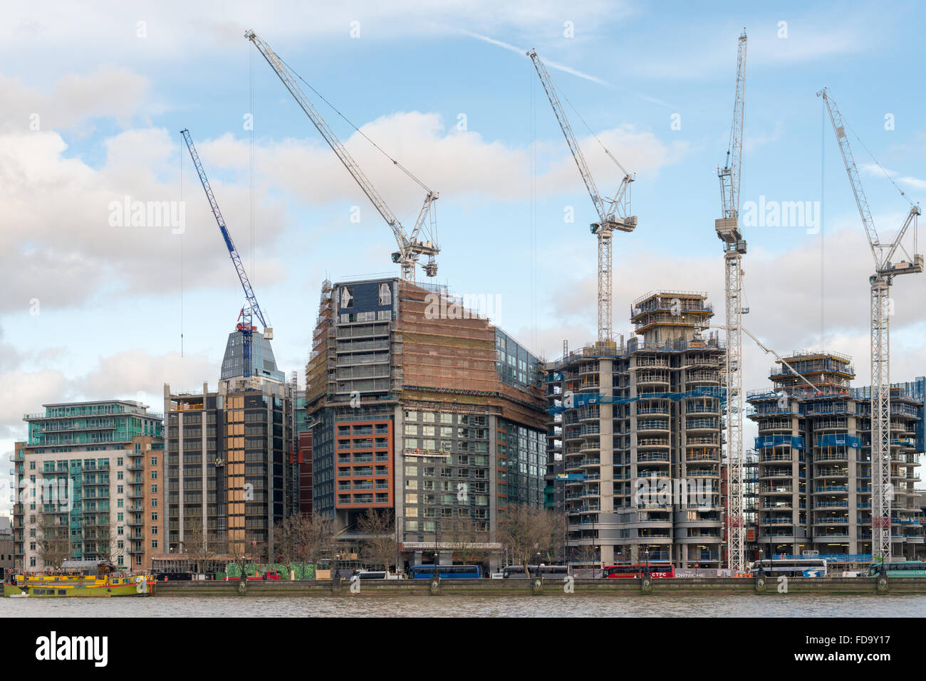 Tall buildings being built on the south side of the River Thames London UK Stock Photo