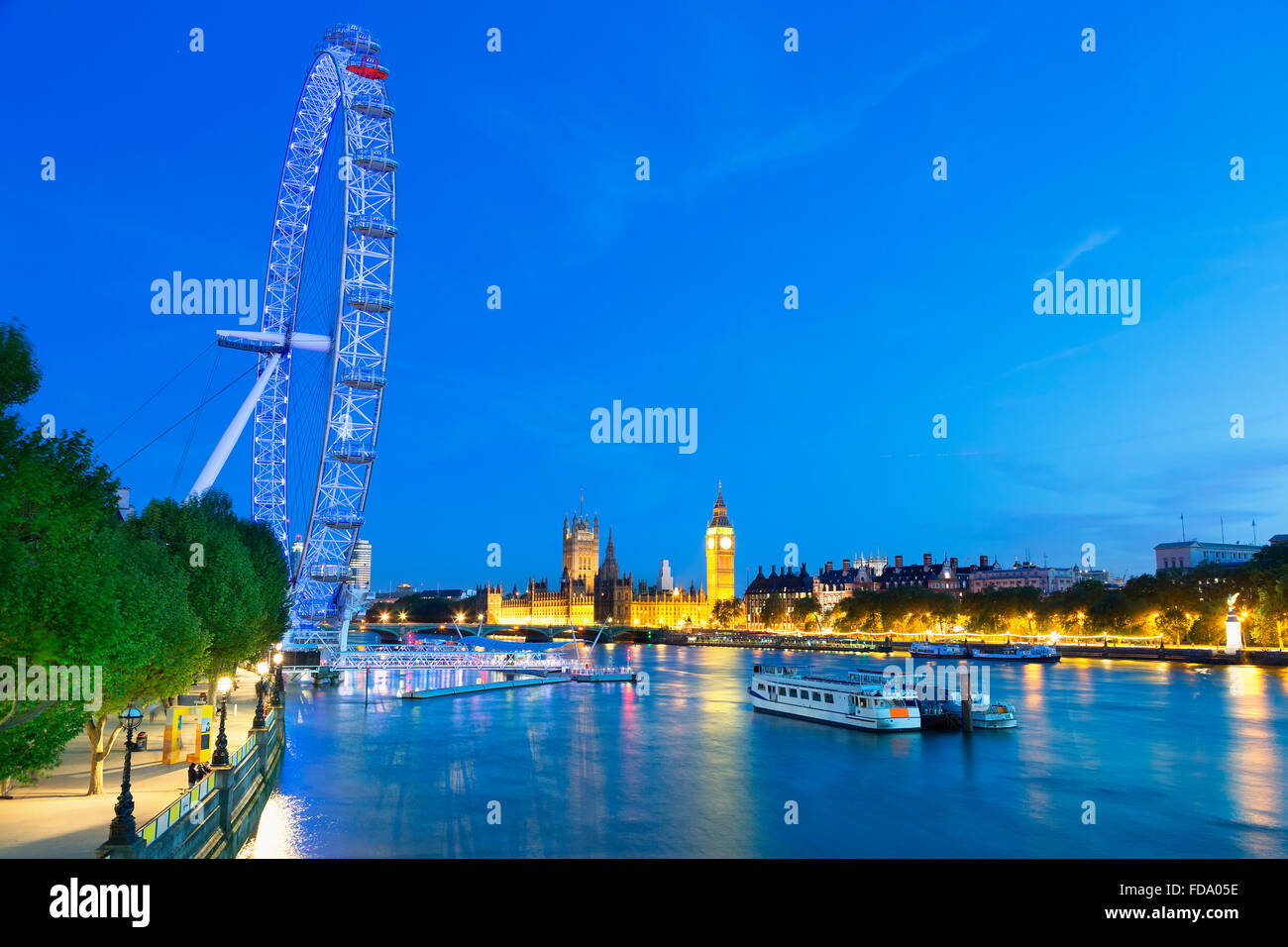 London view on Thames river and parliament at Night Stock Photo