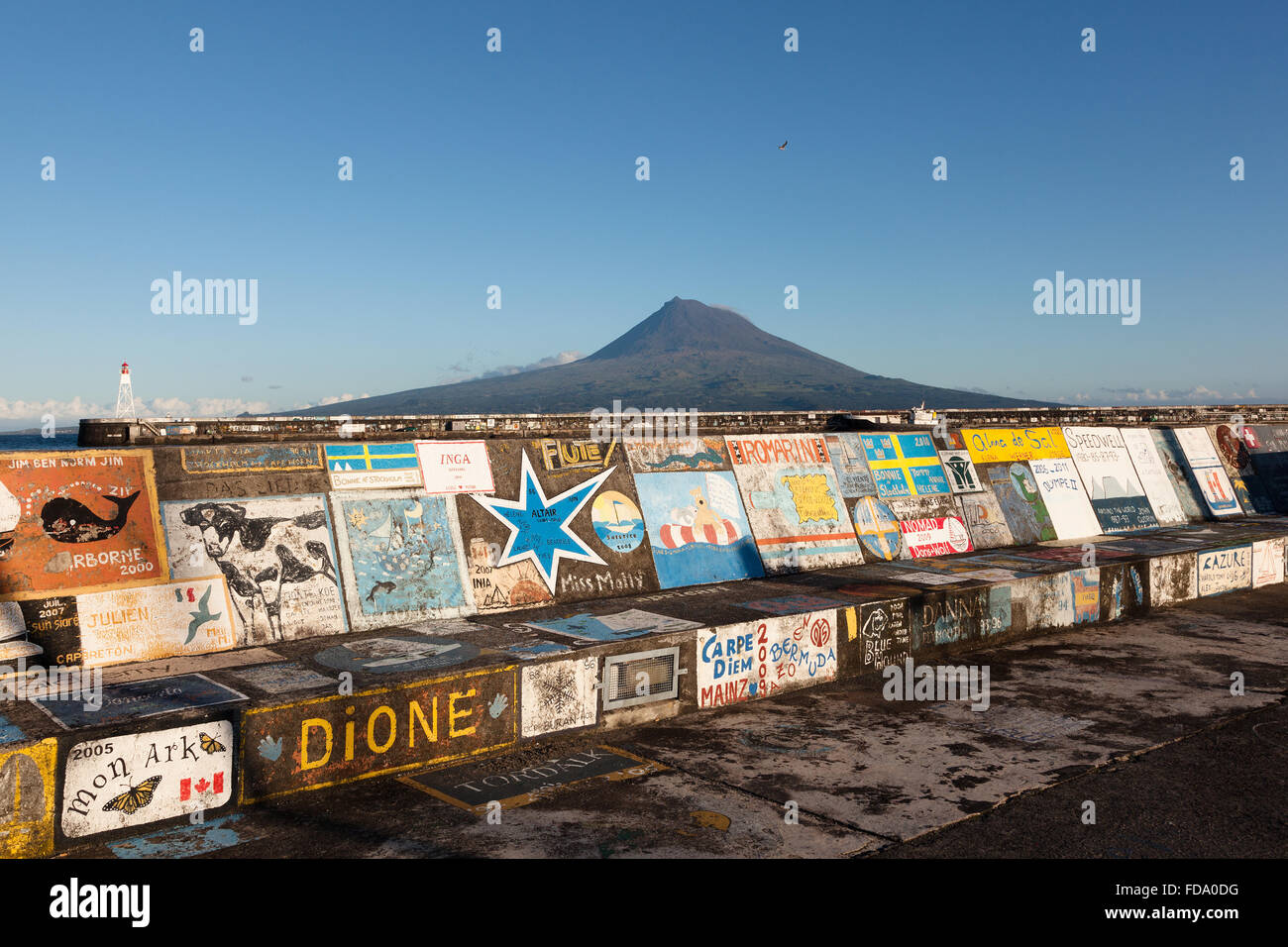 Paintings of yachtsmen in the Marina of the city Horta with view to Pico Island. Azores Portugal Stock Photo