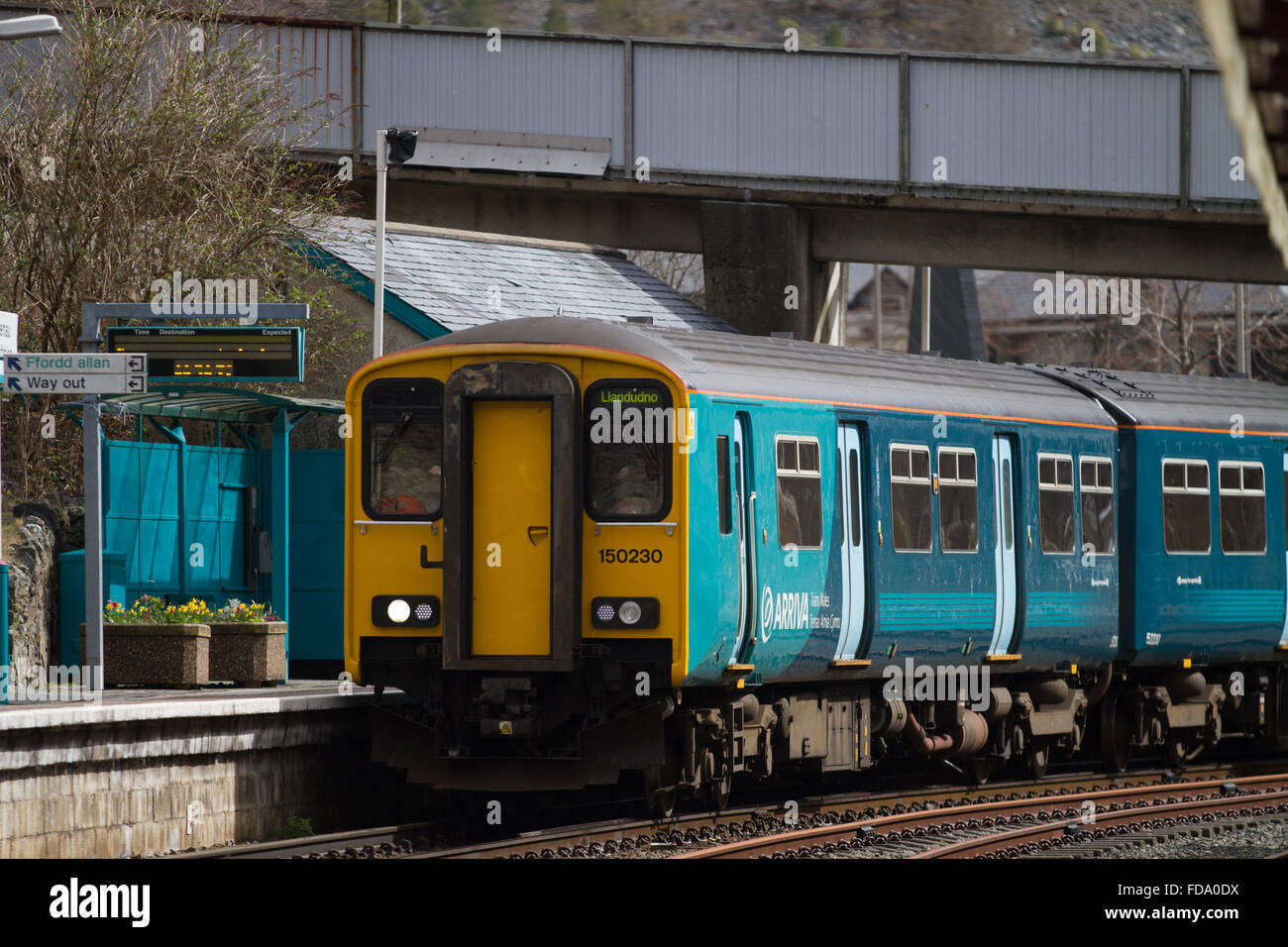 Arriva Trains Wales ATW Class 150 sprinter train, 150230 waits for departure time at Blaneau Ffestiniog BFF Snowdonia with a train for Llandudno. Stock Photo