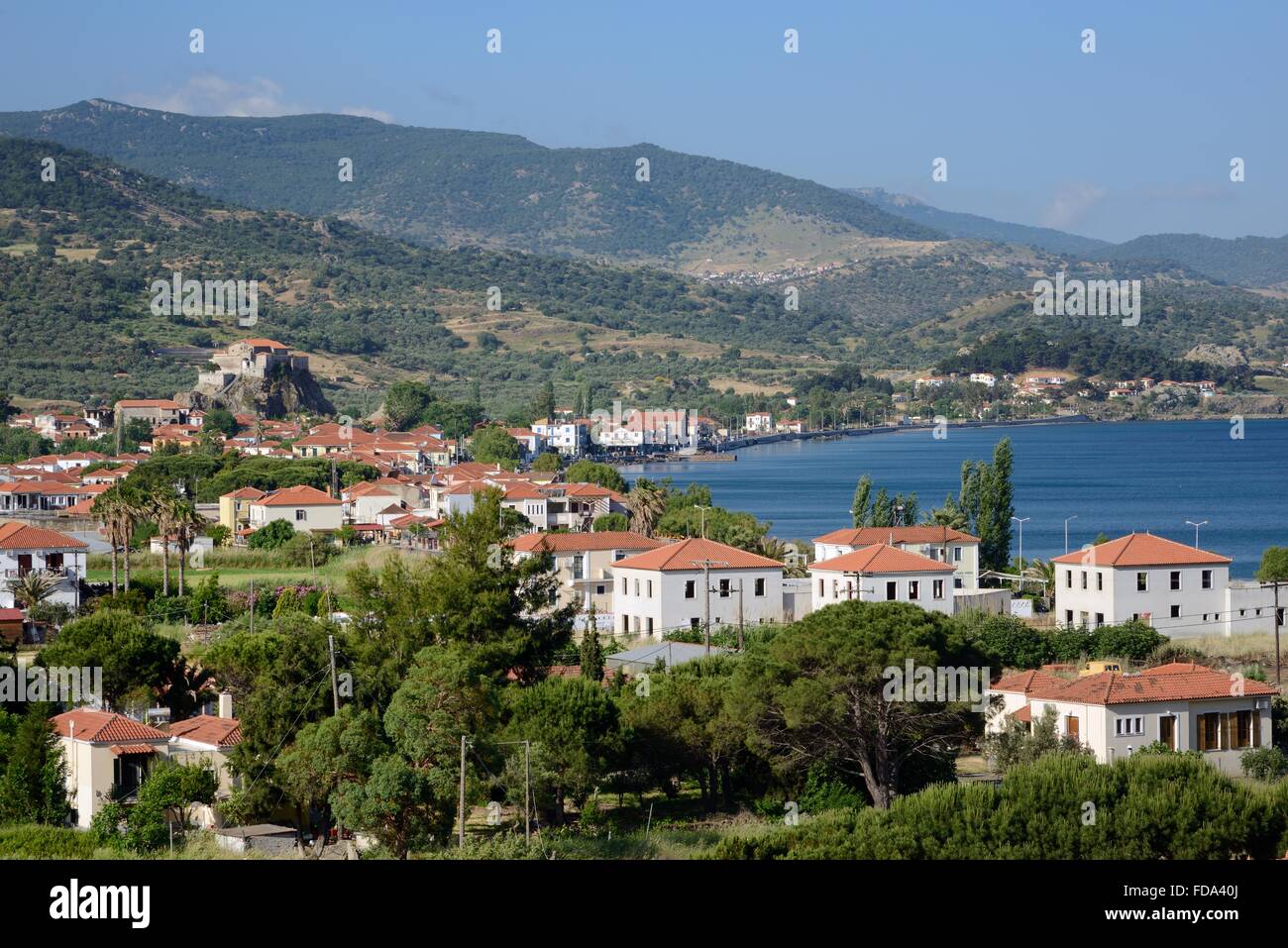 Overview of Petra village, with church of Panagia Glykofiloussa perched on a rock, Lesbos / Lesvos, Greece.. Stock Photo