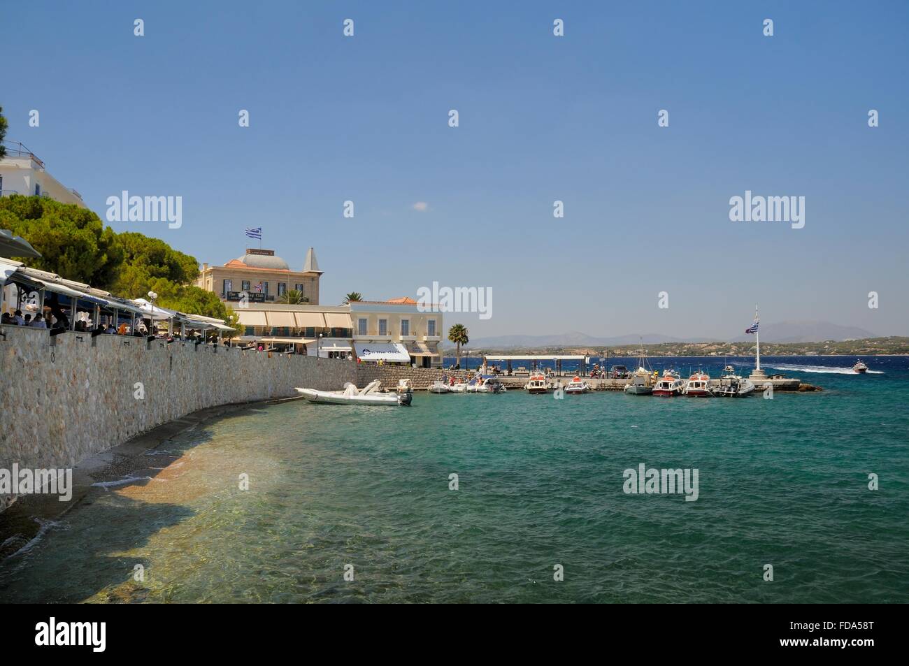 Spetses town seafront, Spetses, Saronic Islands, Attica, Peloponnese, Greece. Stock Photo