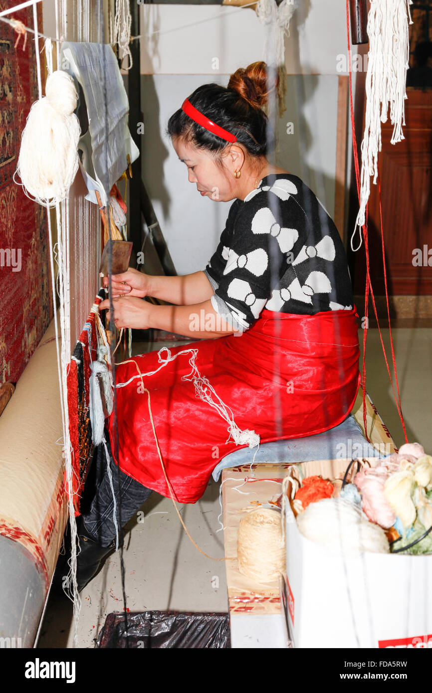 Chinese woman working in silk factory in Hotan China Stock Photo Alamy