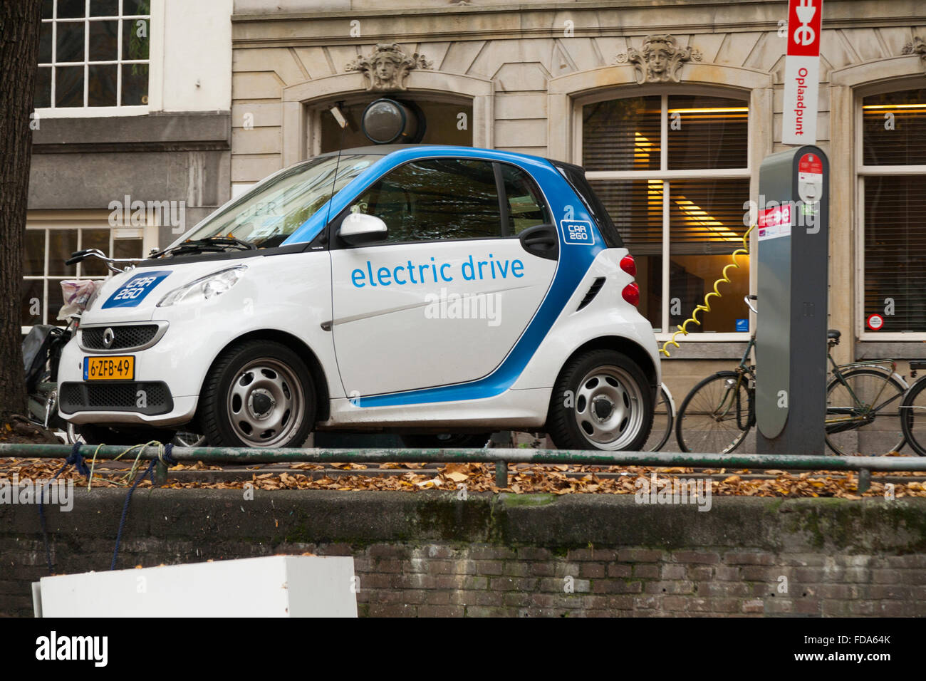 EV / Electric car / electrically powered cars being charged / having battery / batteries