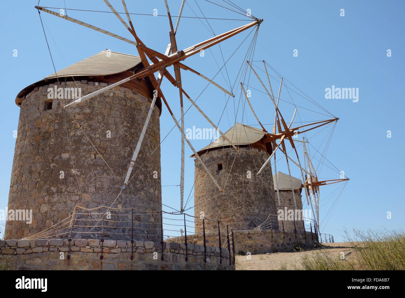 Restored windmills of the Monastery of St. John the Theologian, Chora, Patmos, Dodecanese Islands, Greece. Stock Photo
