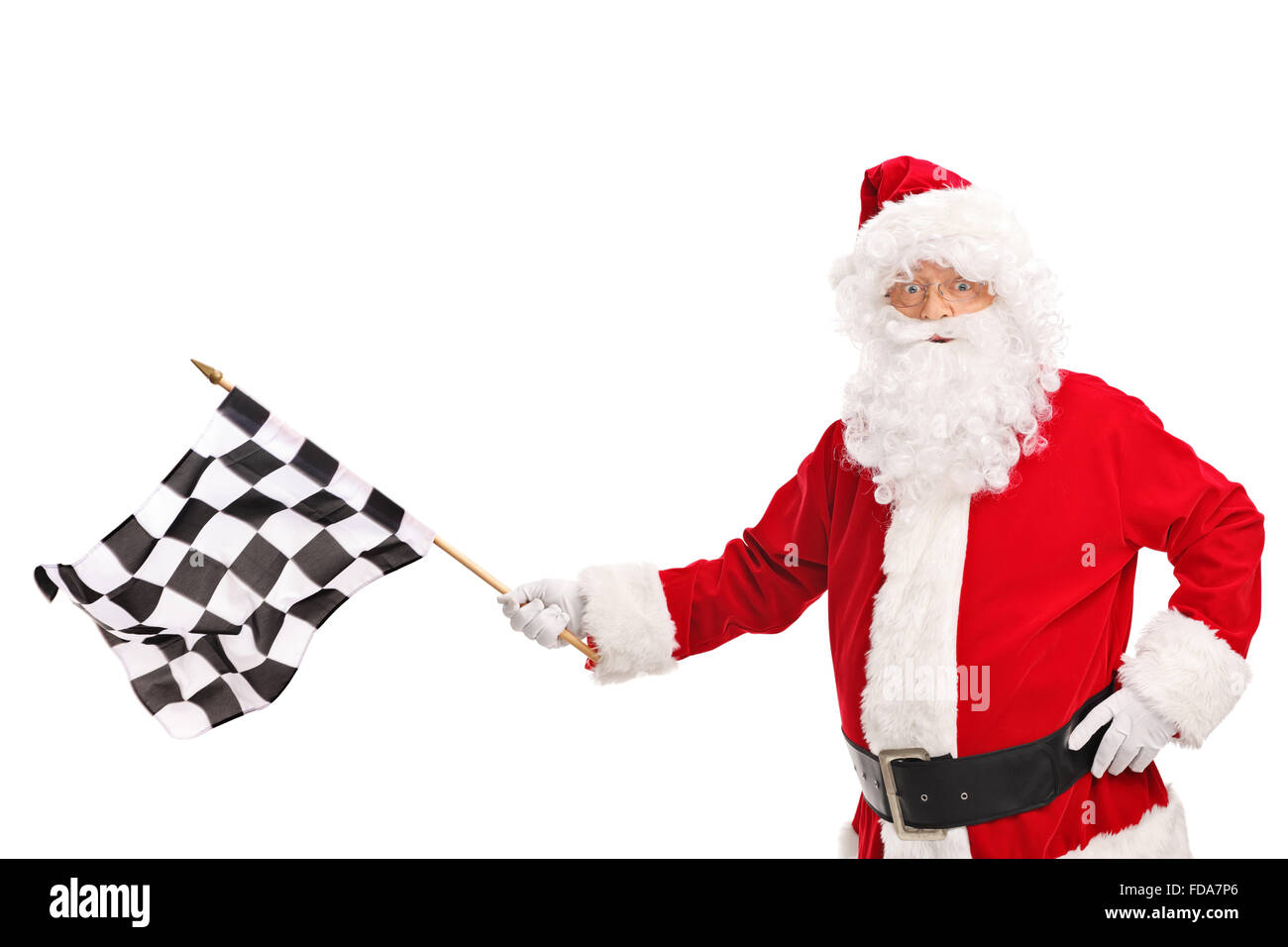 Studio shot of Santa Claus waving a checkered race flag and looking at the camera isolated on white background Stock Photo